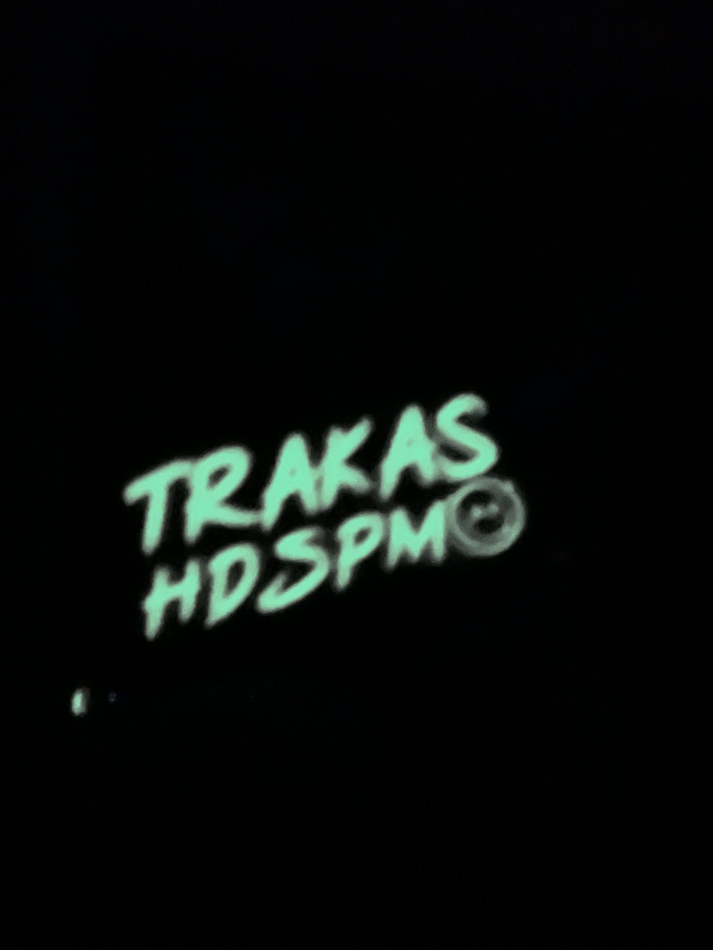 TRAKAS HDSPTM glows in the dark hat pin