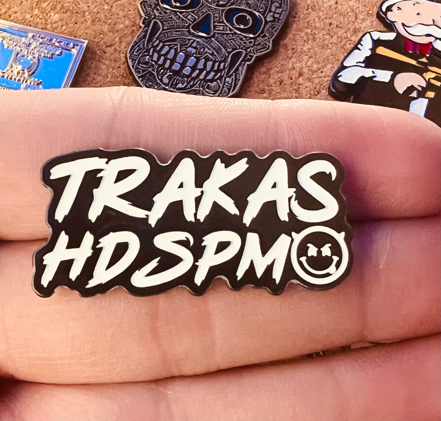 TRAKAS HDSPTM glows in the dark hat pin