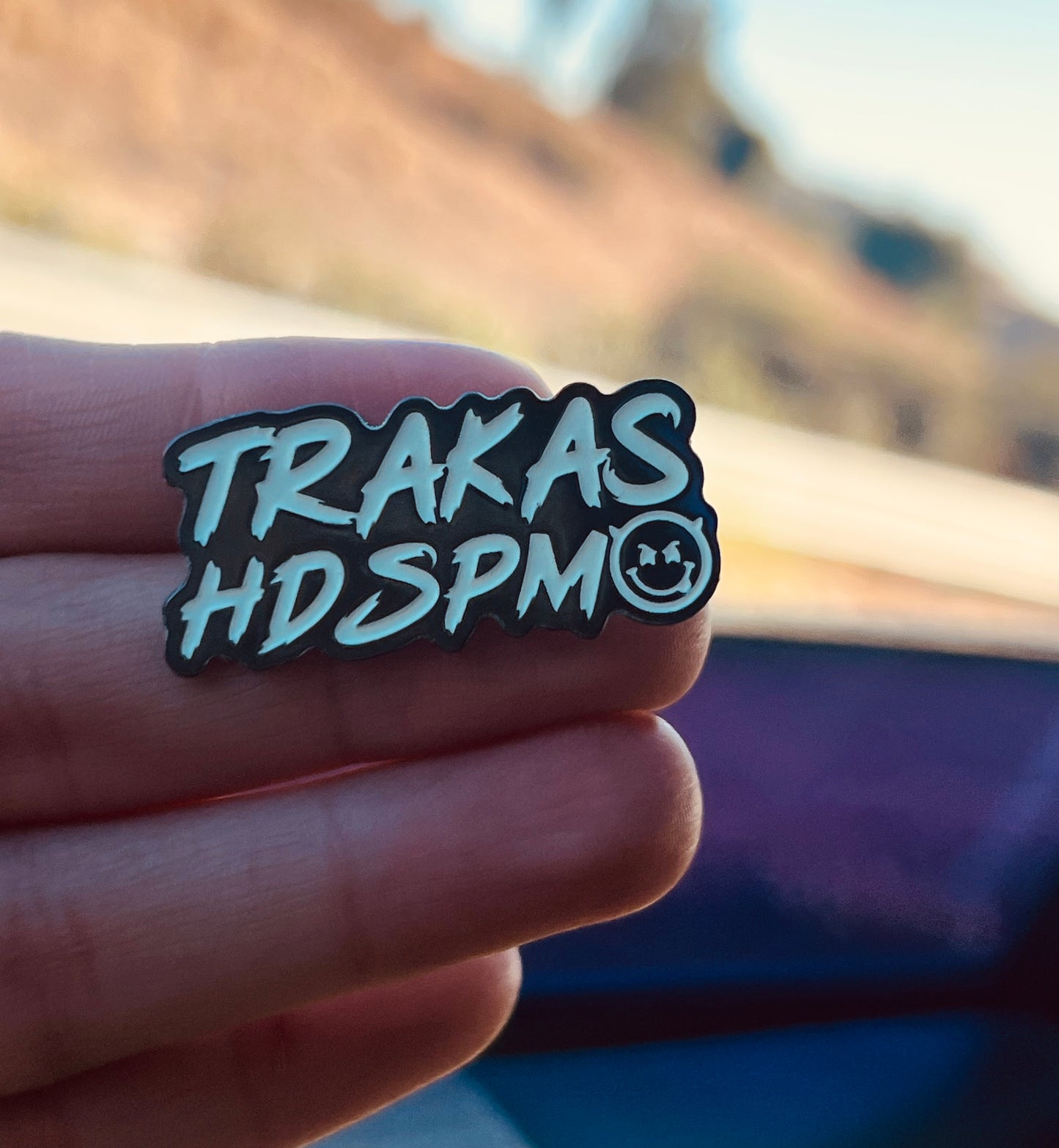 TRAKAS HDSPTM glows in the dark hat pin