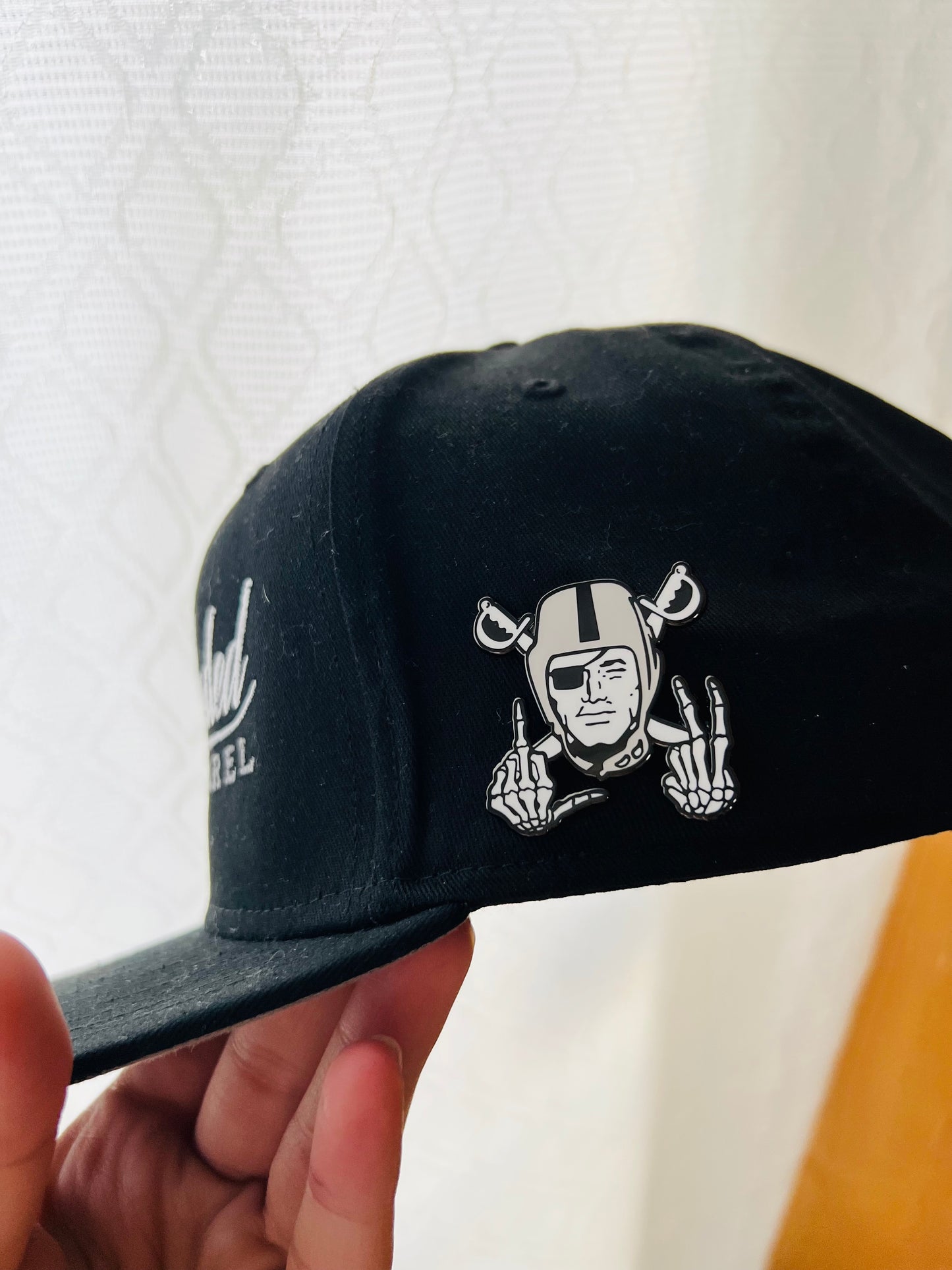 Raiders hat pin